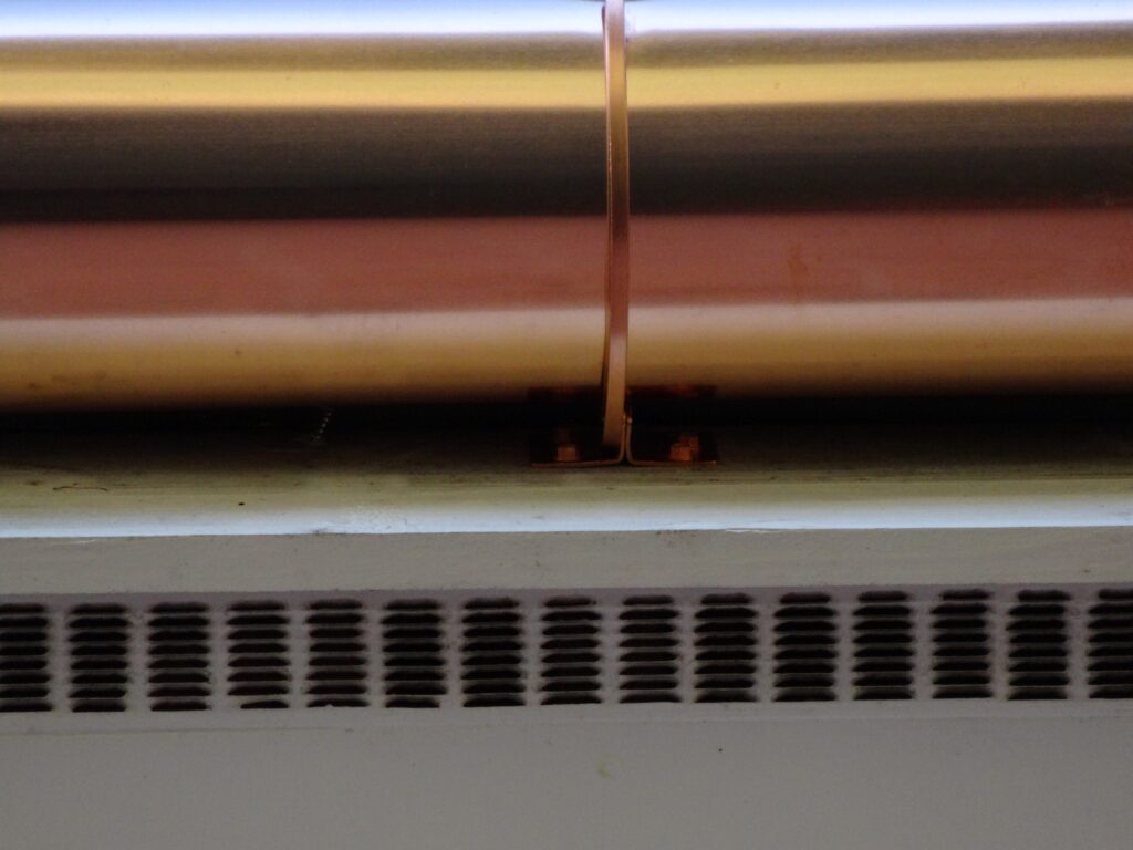 Copper gutter run with soldered end cap