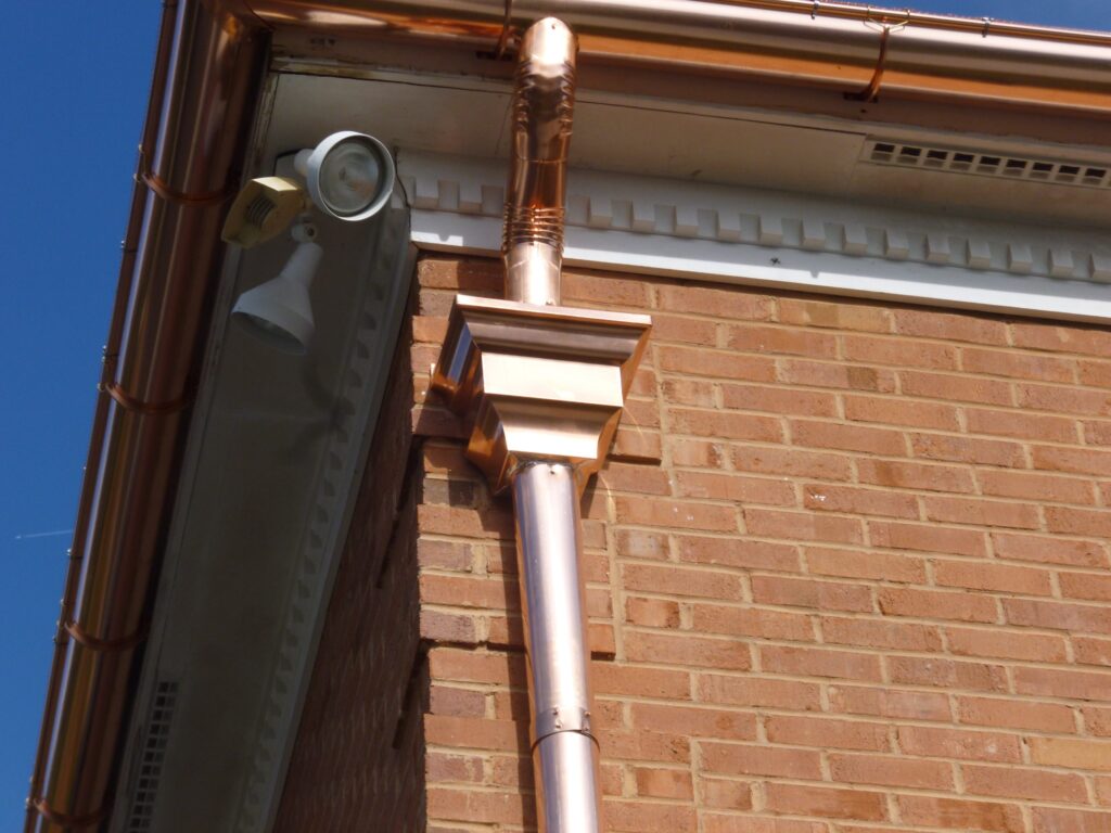Copper downspout with fabricated offset