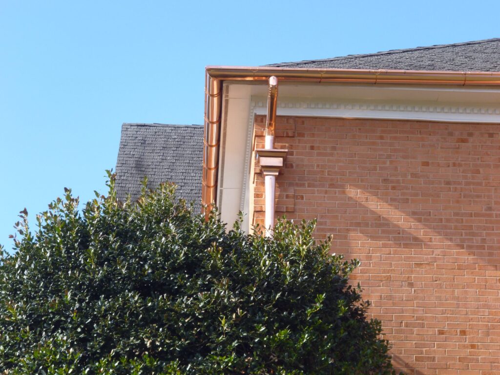 Copper gutter corner and outlet