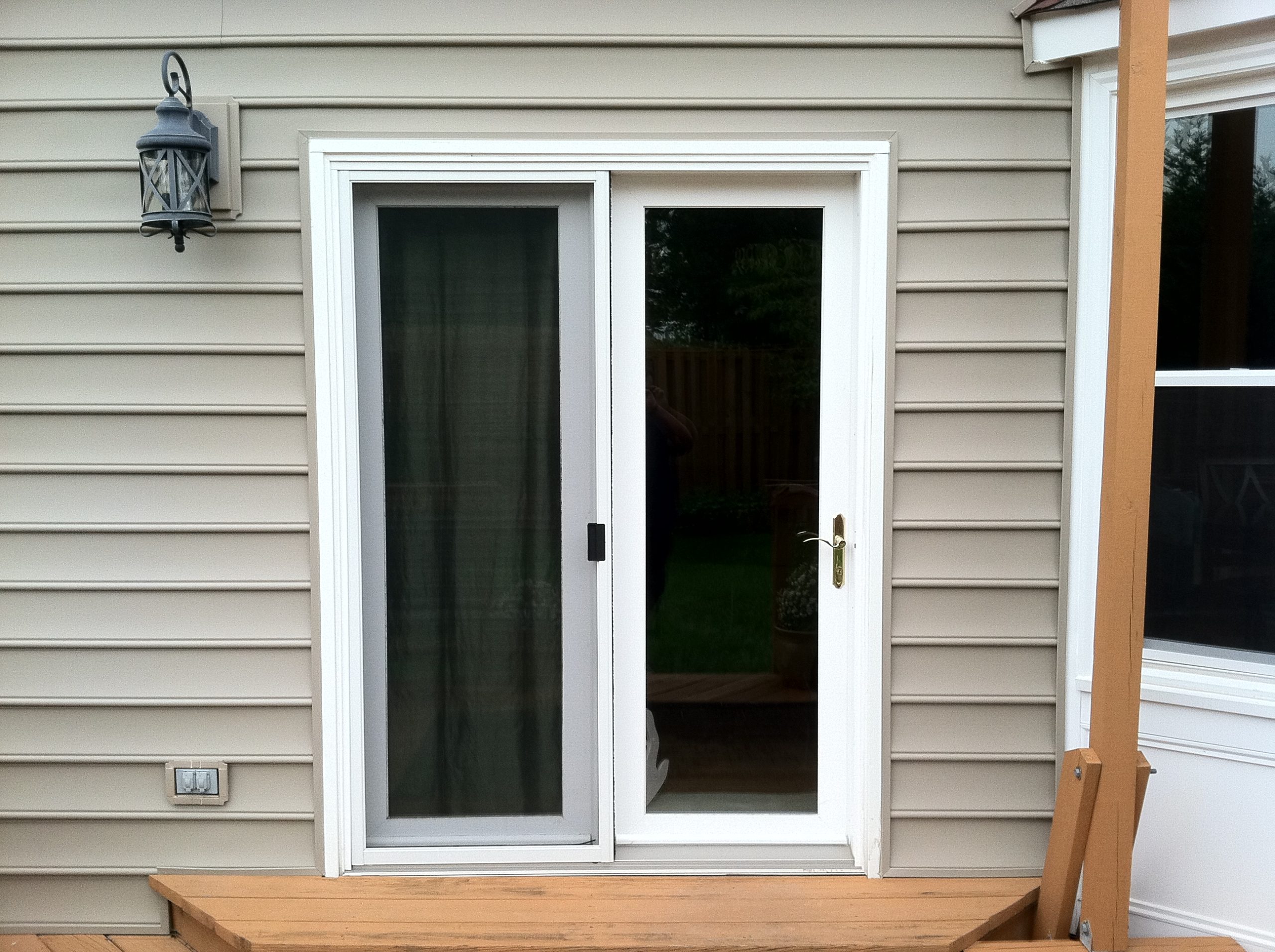 Sliding patio door installed by Sunshine Contracting