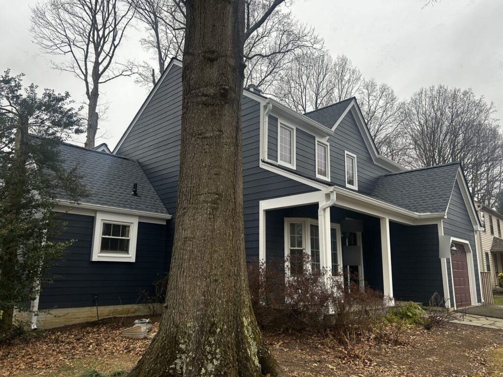Front of a Burke, VA home after James Hardie Cedarmill lap siding in Deep Ocean with white trim and a new GAF roof
