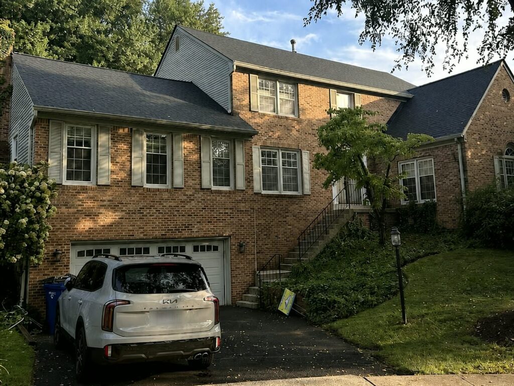 New GAF architectural shingle roof on a brick colonial in McLean, VA, installed by Sunshine Contracting