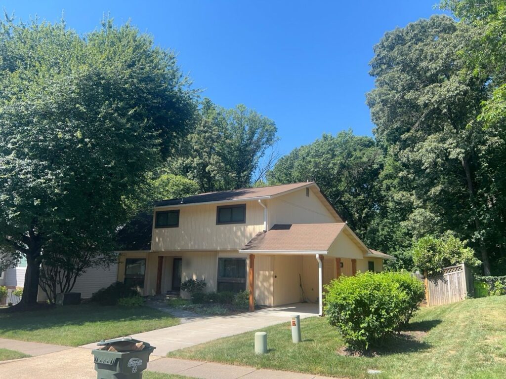 Springfield, VA home before siding and roof replacement, front right view