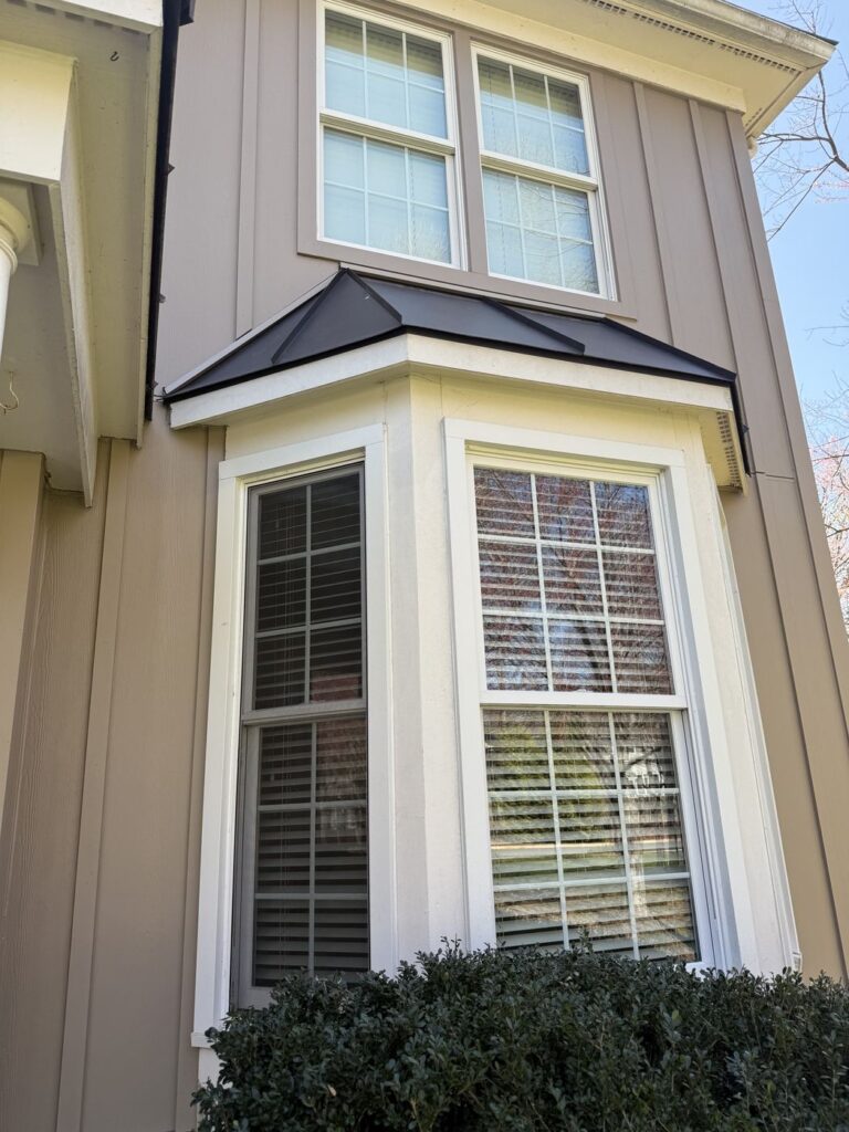 James Hardie board and batten siding and trim around a bay window in Annandale, VA