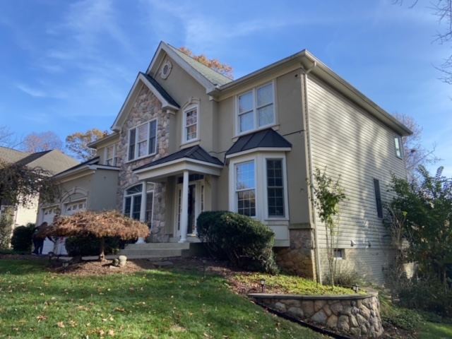 Annandale, VA home before, with the original stucco walls