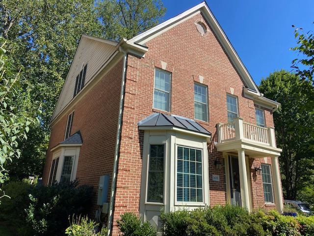 Falls Church, VA home before, with the old siding on the side walls