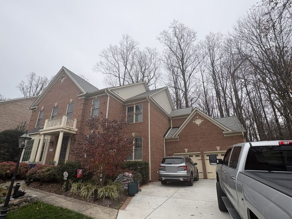 James Hardie siding on the gables and upper walls of a Falls Church, VA brick home