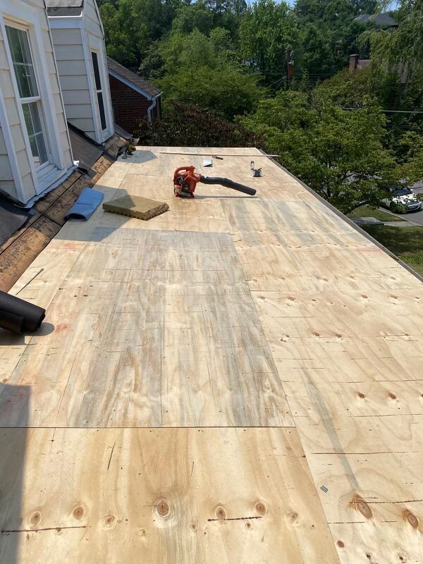 New plywood decking on the low-slope section of an Arlington, VA roof