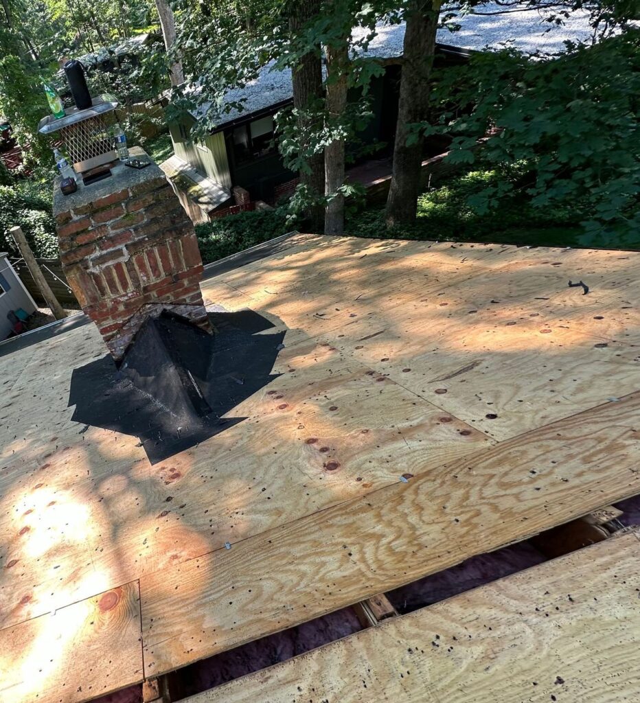 New plywood roof decking going down on a Falls Church, VA home