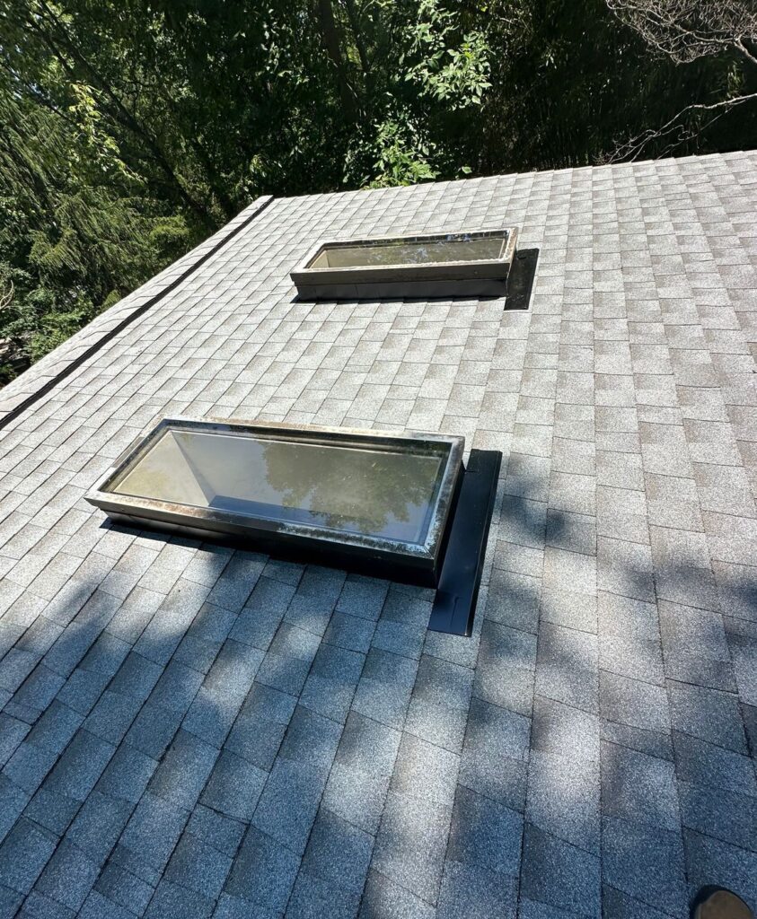 GAF Timberline HDZ shingles in Fox Hollow Gray around skylights on a Falls Church, VA roof