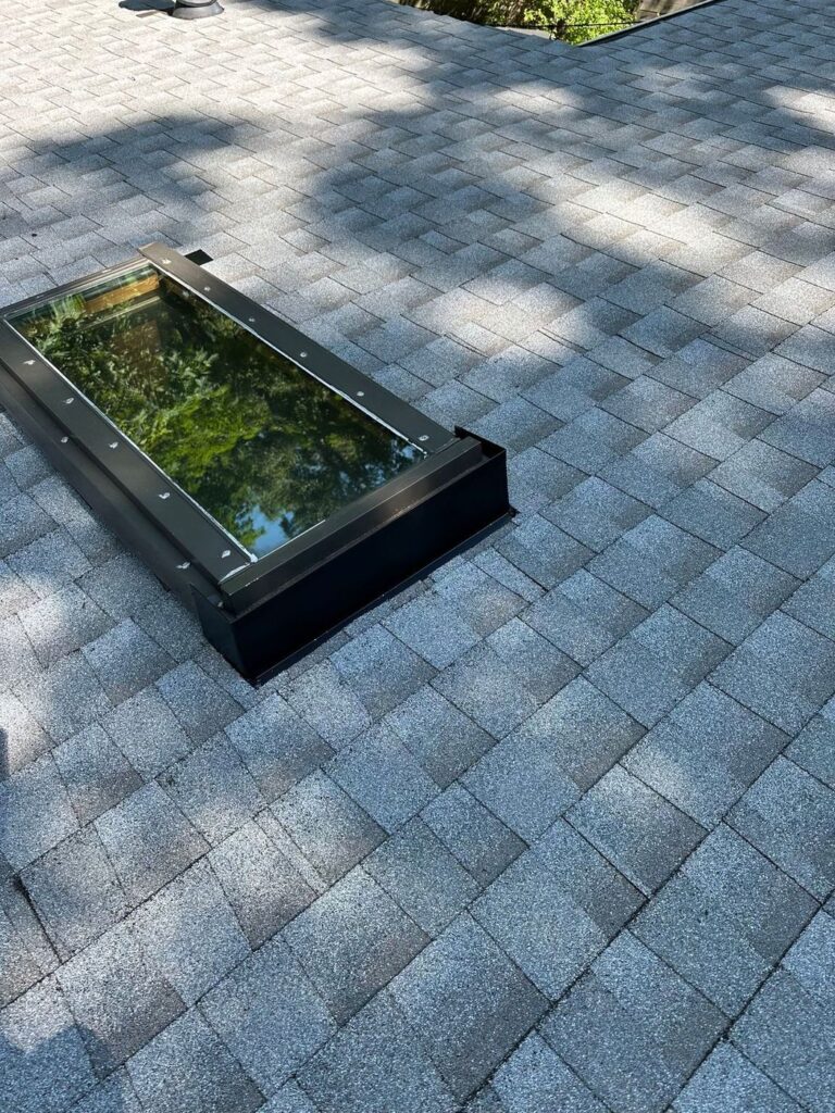New black flashing around a skylight on a GAF roof in Falls Church, VA