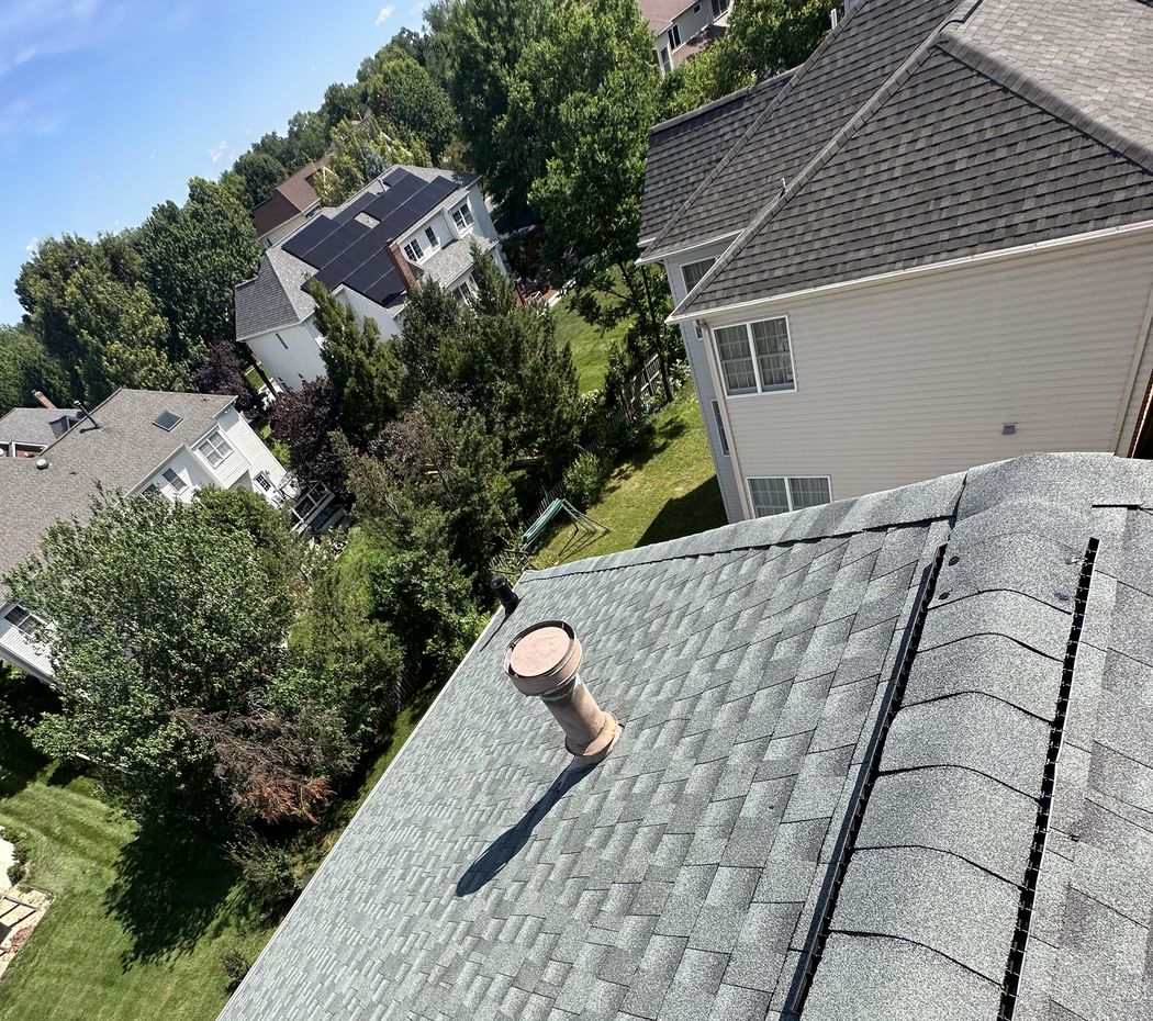 New GAF architectural shingles and ridge vent on a Herndon, VA roof
