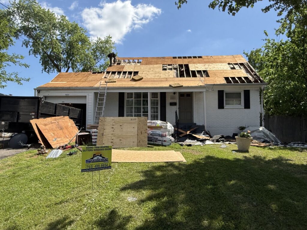 Roof tear-off on a Manassas, VA home with new decking going down