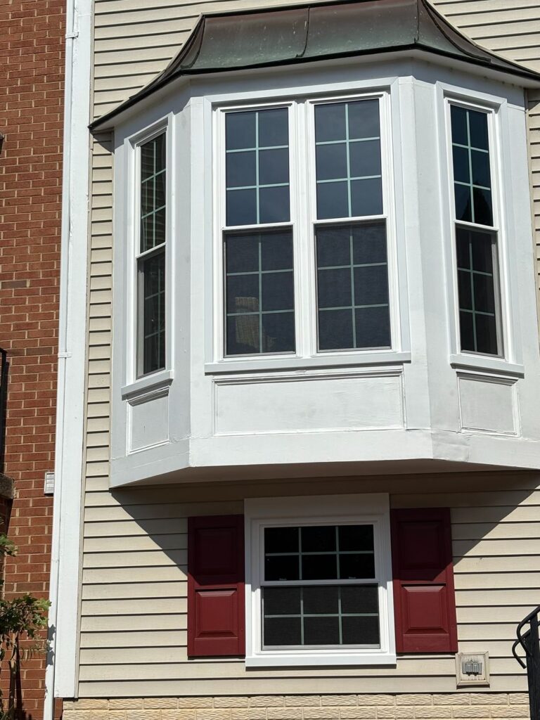New white replacement windows in the front bay of a Fairfax, VA home