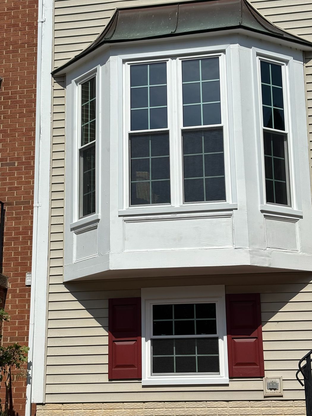 New white replacement windows in the front bay of a Fairfax, VA home