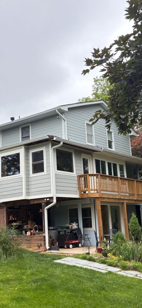 Back of a Warrenton, VA home with new light gray-blue James Hardie lap siding