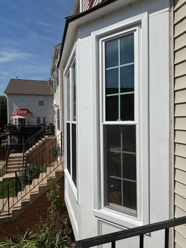Side view of new replacement windows in a bay on a Fairfax, VA home