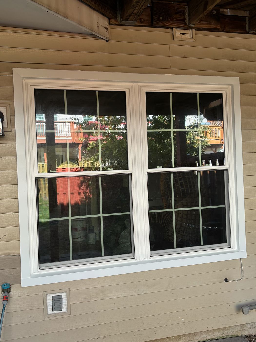 New double replacement windows with grids on a Fairfax, VA home